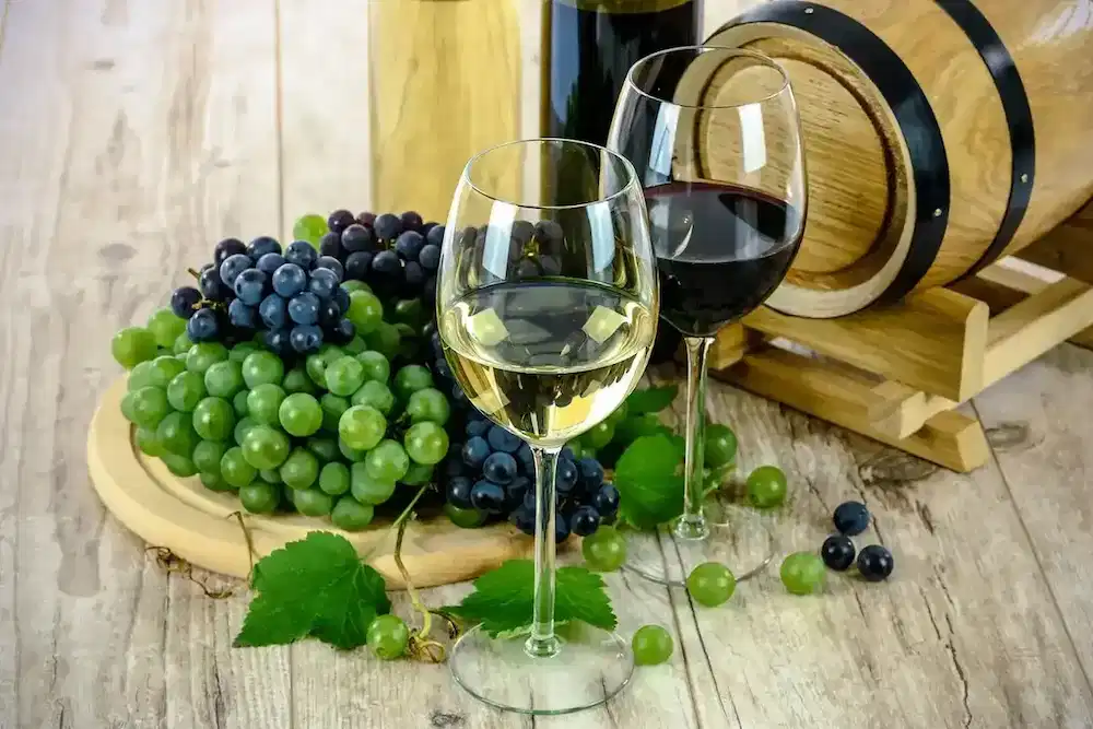 A picture of timeless wine drink and grapes